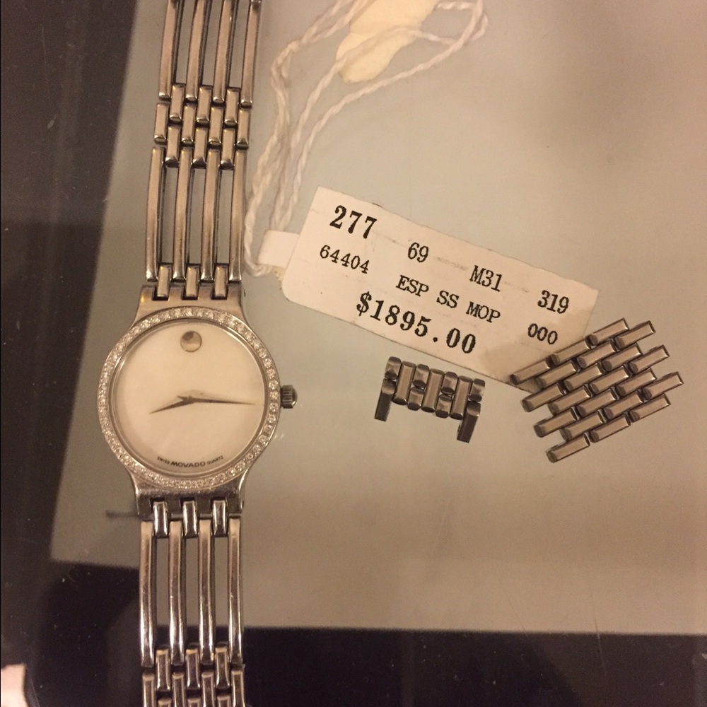 Movado diamond gray Mother of Peral dial Lady watch
